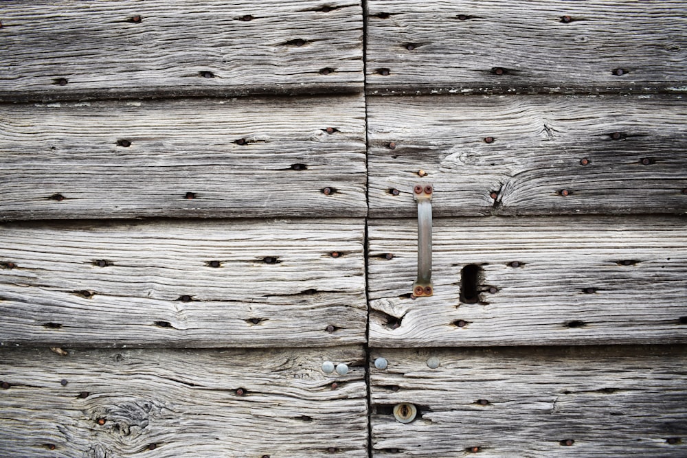 closeup photo of gray wooden board