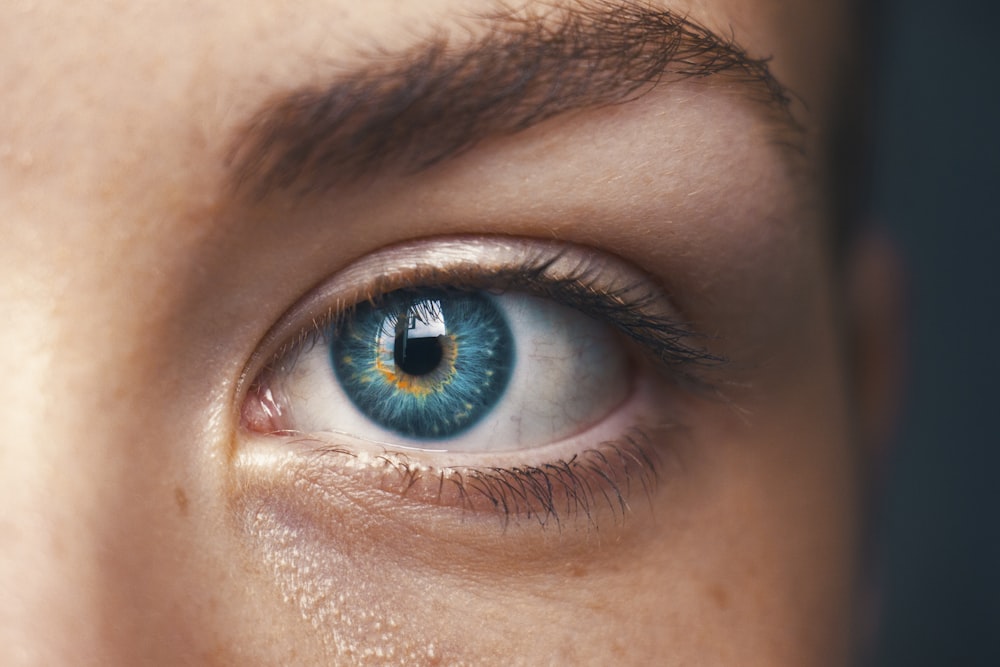 selective focus of blue-eyed person