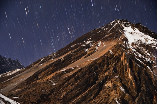 brown mountains during rainy days in Annapurna Nepal