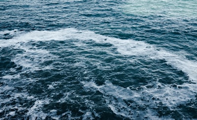sea during daytime disturbed google meet background