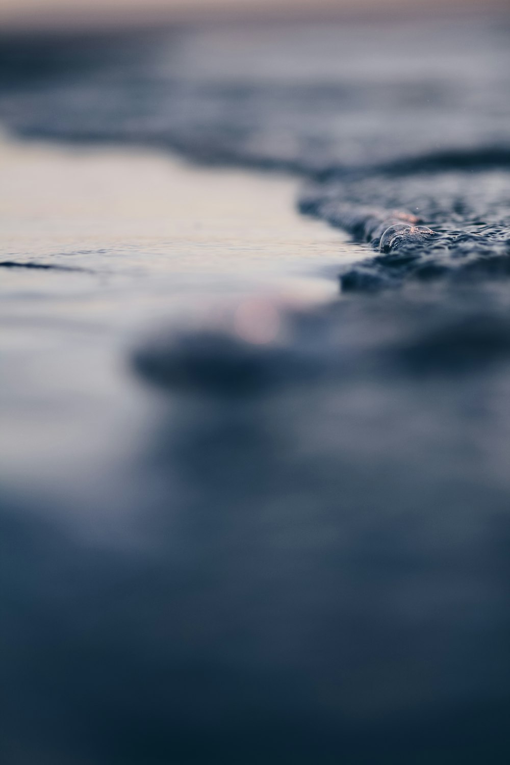 shallow focus photo of water wave