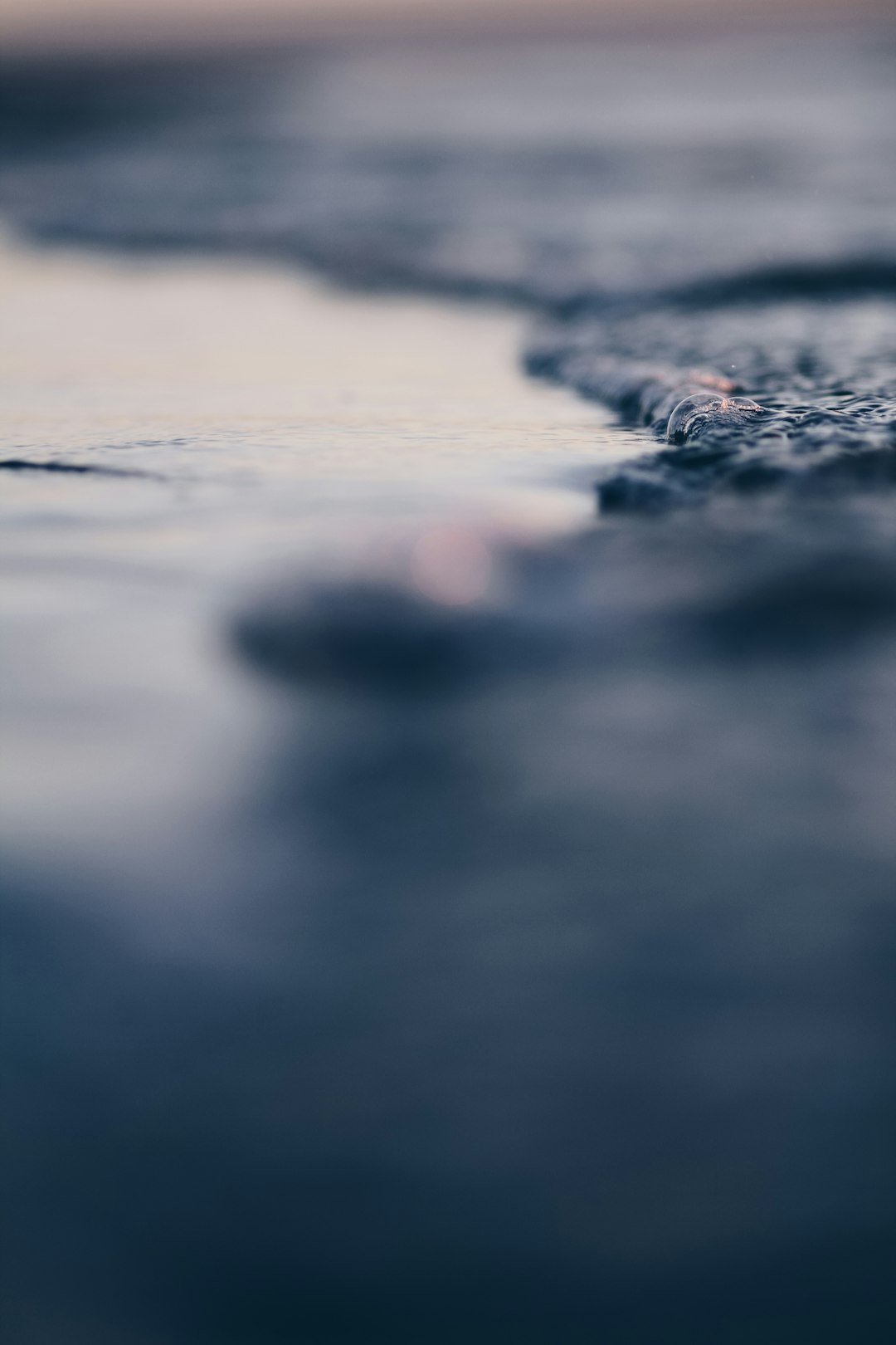 shallow focus photo of water wave