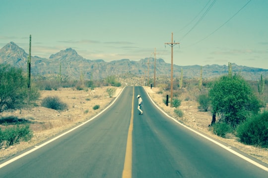 man standing in the middle of road in Loreto Mexico