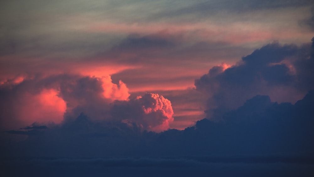 sea of clouds during golden hour