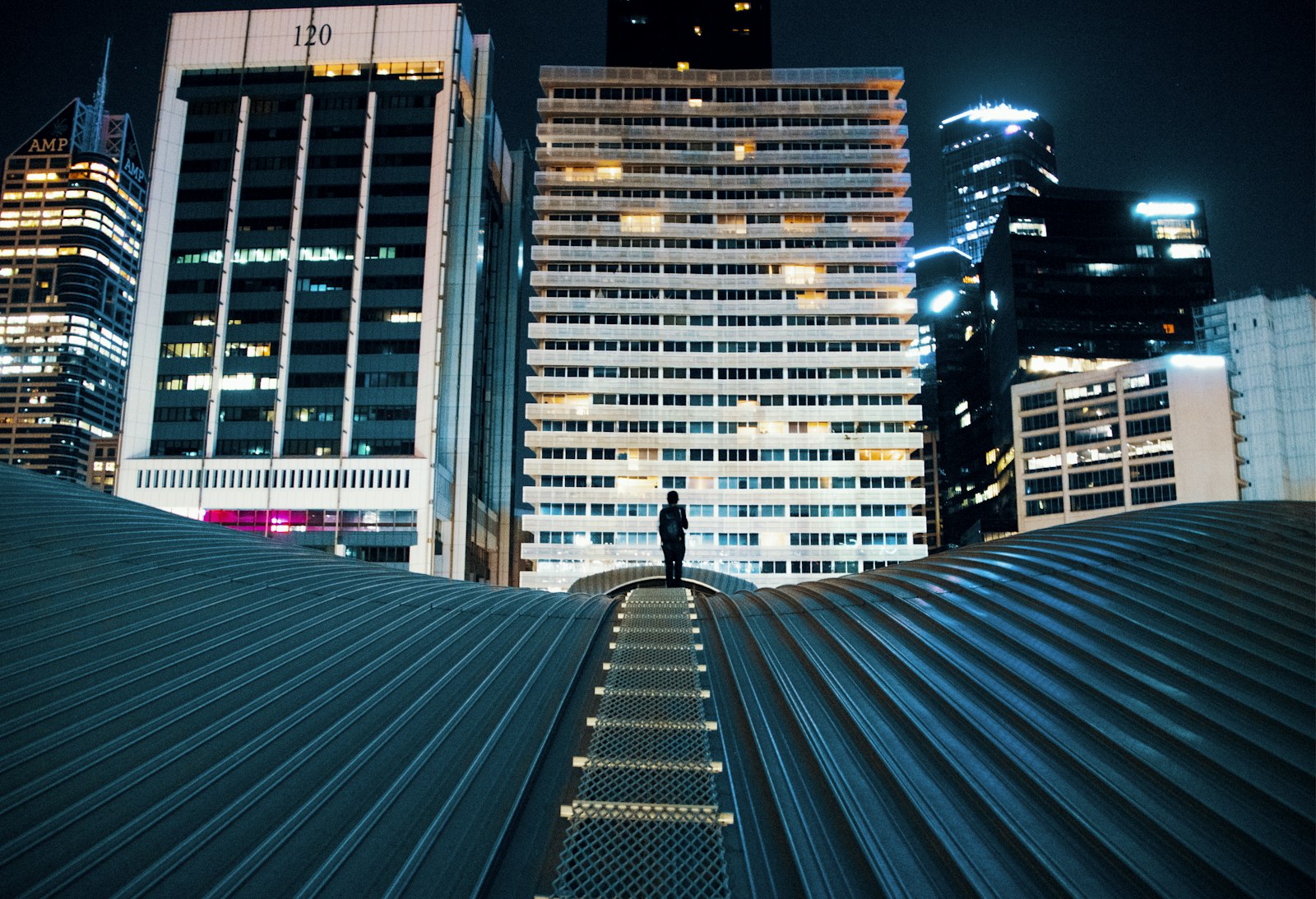 Nikon D5300 + Tamron 18-270mm F3.5-6.3 Di II VC PZD sample photo. Person standing on building photography