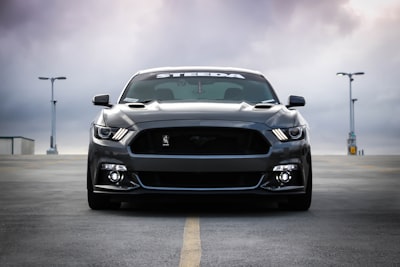 black shelby car on road car zoom background