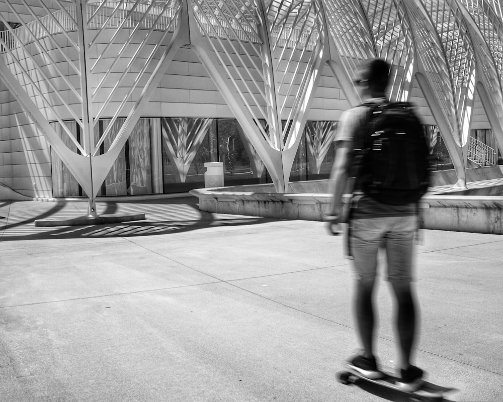 man standing on skateboard