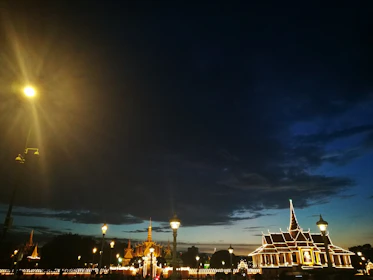 A cityscape at dusk showcasing smart-city infrastructure illuminated and active.