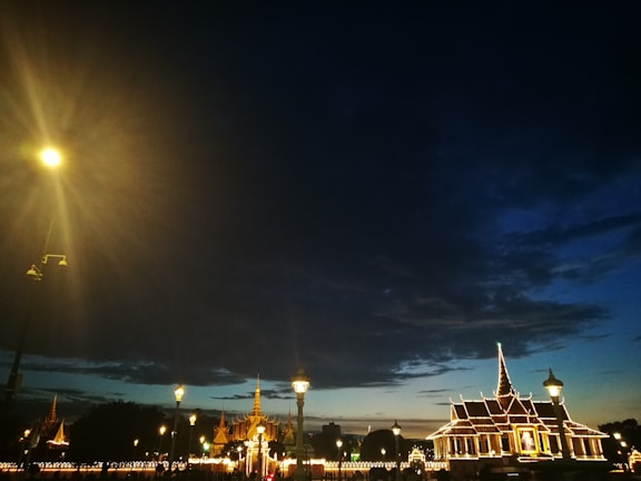 A cityscape at dusk showcasing smart technology integrated into urban infrastructure.