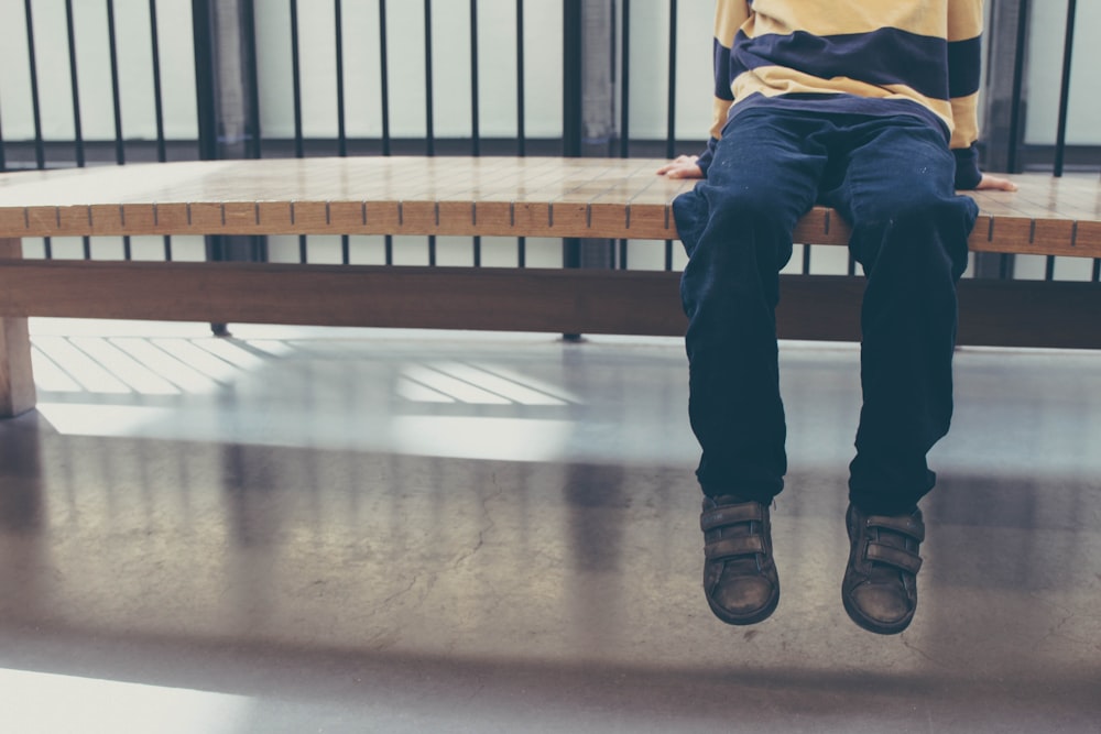 person sitting on bench