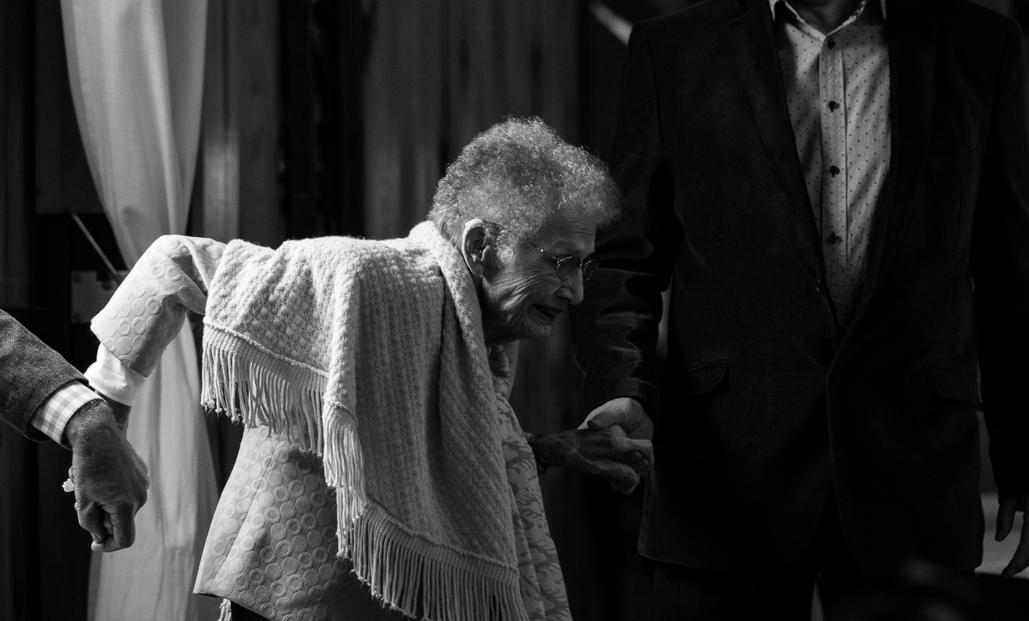 grayscale photo of woman with scarf