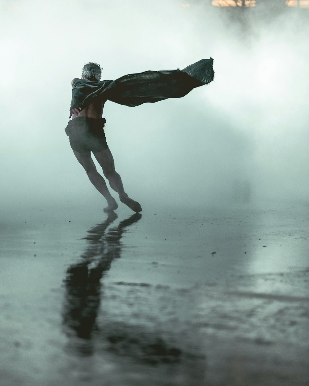 man on gray concrete road