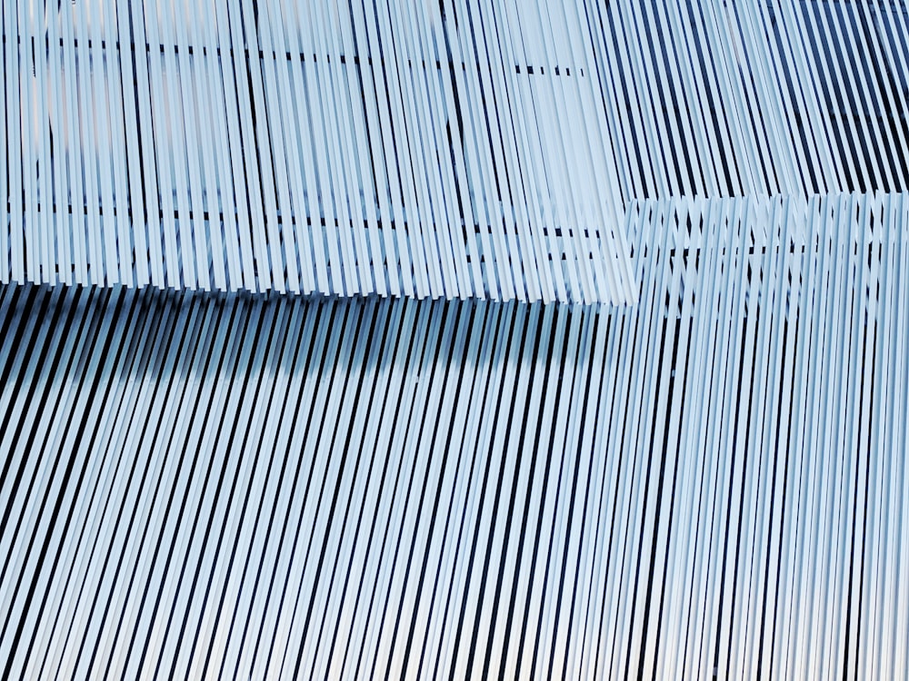 an abstract photo of a blue sky and lines