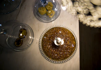 Various pastillage figures drying on a kitchen counter with natural light.