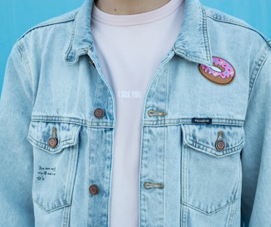 close shot of person denim top