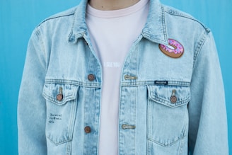 close shot of person denim top