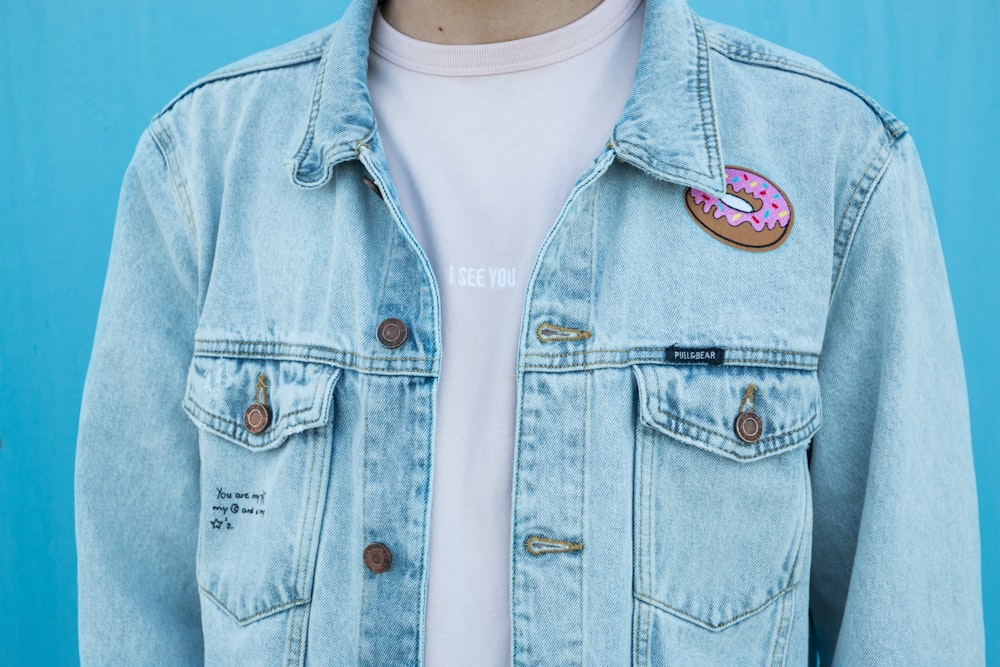 close shot of person denim top