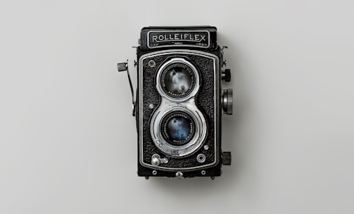 black and silver vintage camera