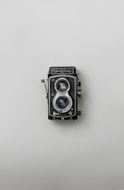 black and silver vintage camera