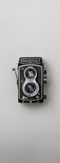 black and silver vintage camera