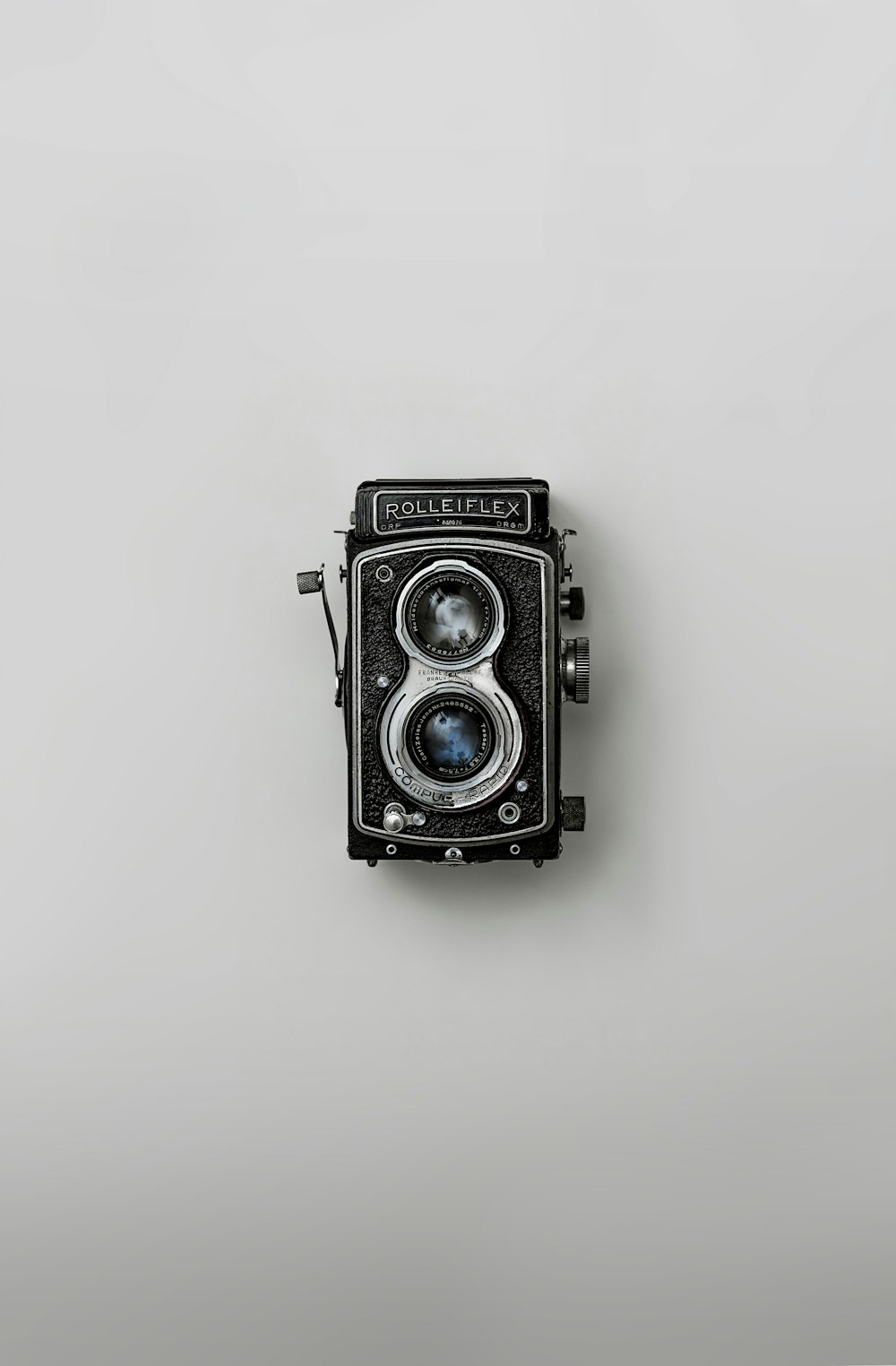 black and silver vintage camera