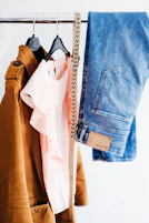 women's four assorted apparel hanged on clothes rack