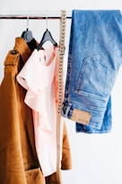 women's four assorted apparel hanged on clothes rack