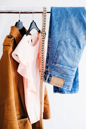 women's four assorted apparel hanged on clothes rack