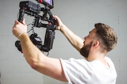 man holding camera with stabilizer