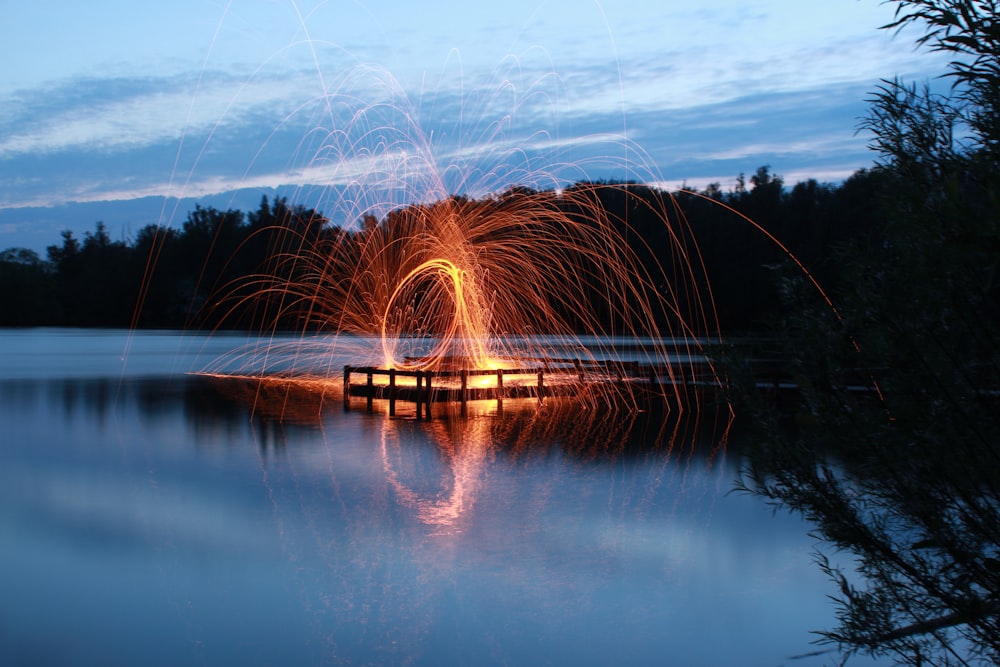 slow shutter photo of fire dance