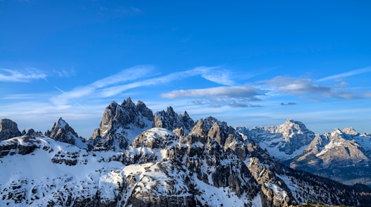 birds eye view of snowy mountains in Dolomites Italy