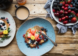 fruit sandwich on a blue ceramic plate