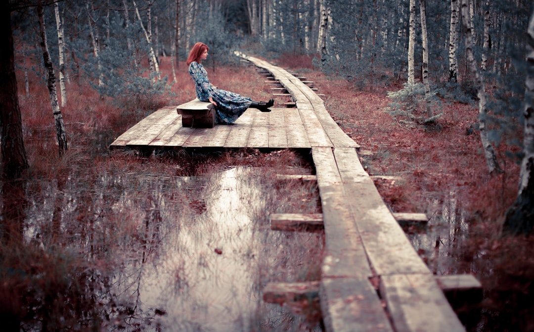 woman seating on bench