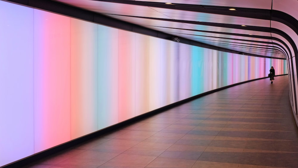 woman walking in hallway