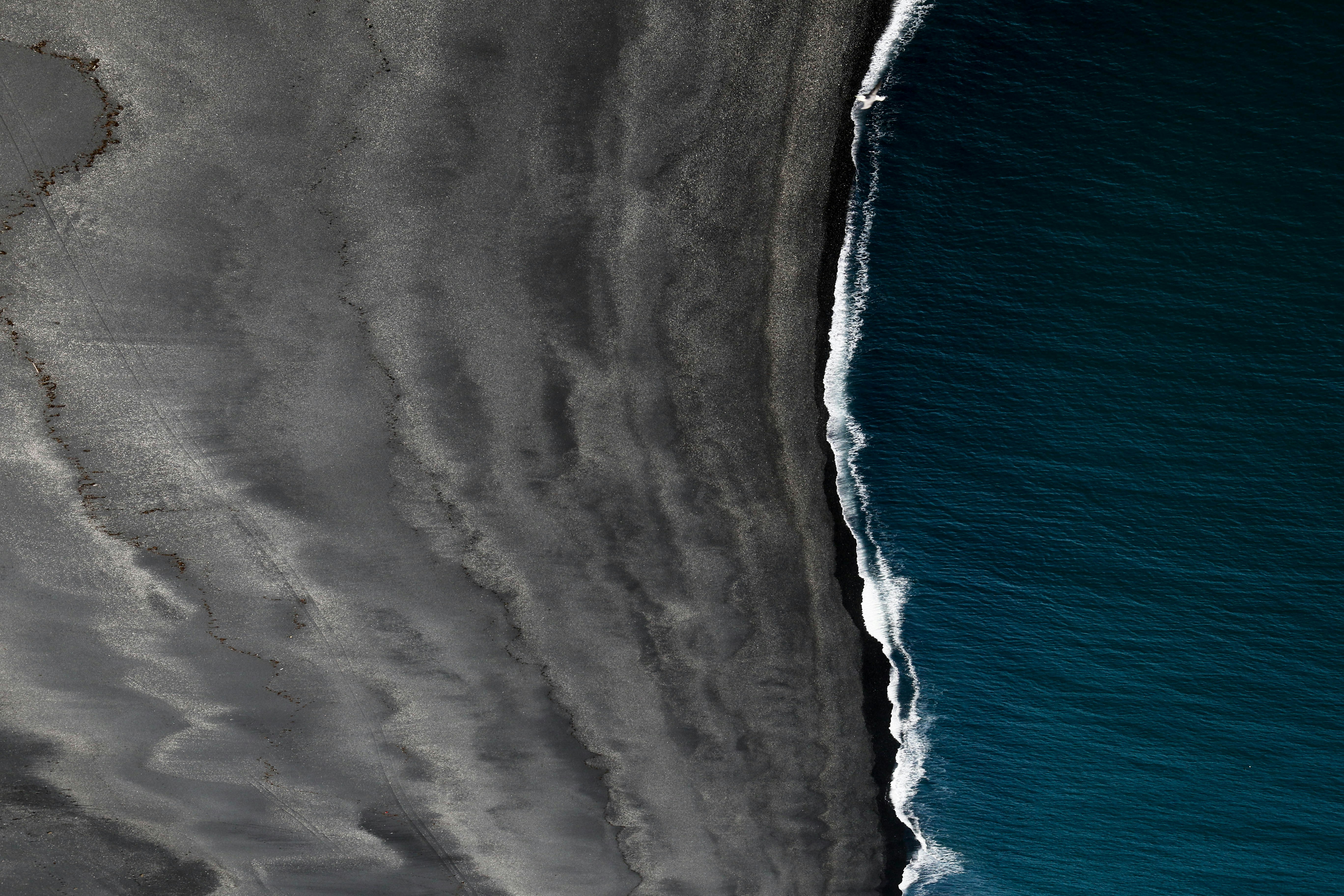 Gray and blue shoreline
