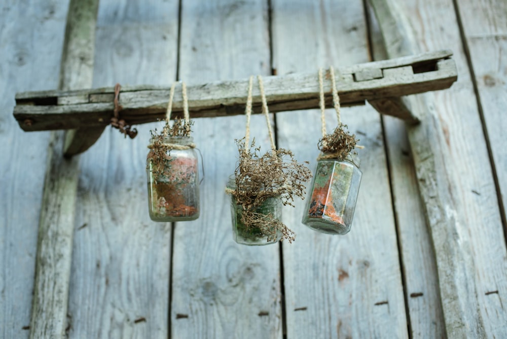 clear glass jar hanging on wall