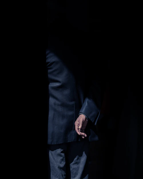 Man in a black suit jacket