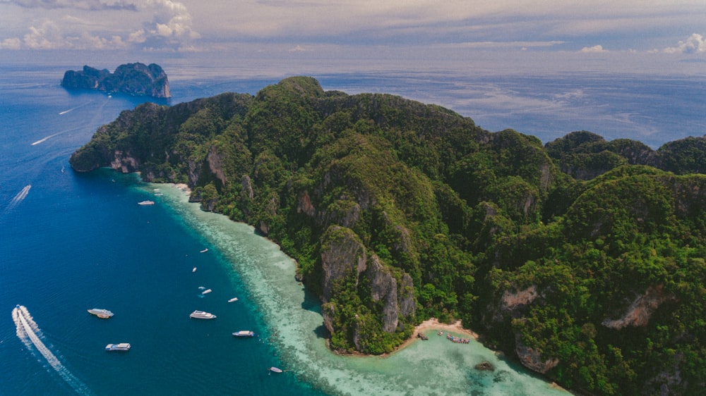 aerial photography of island under blue sky