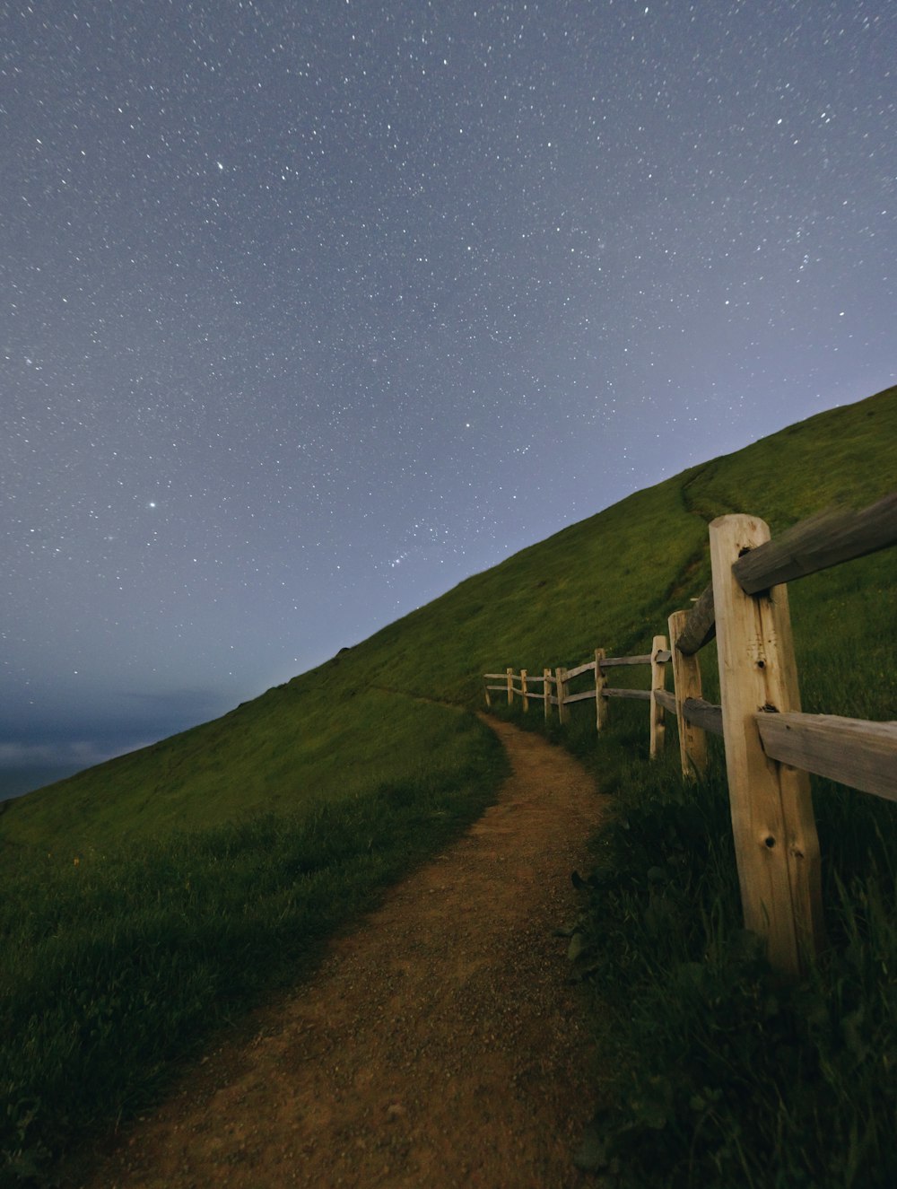 brown wooden fence on farm