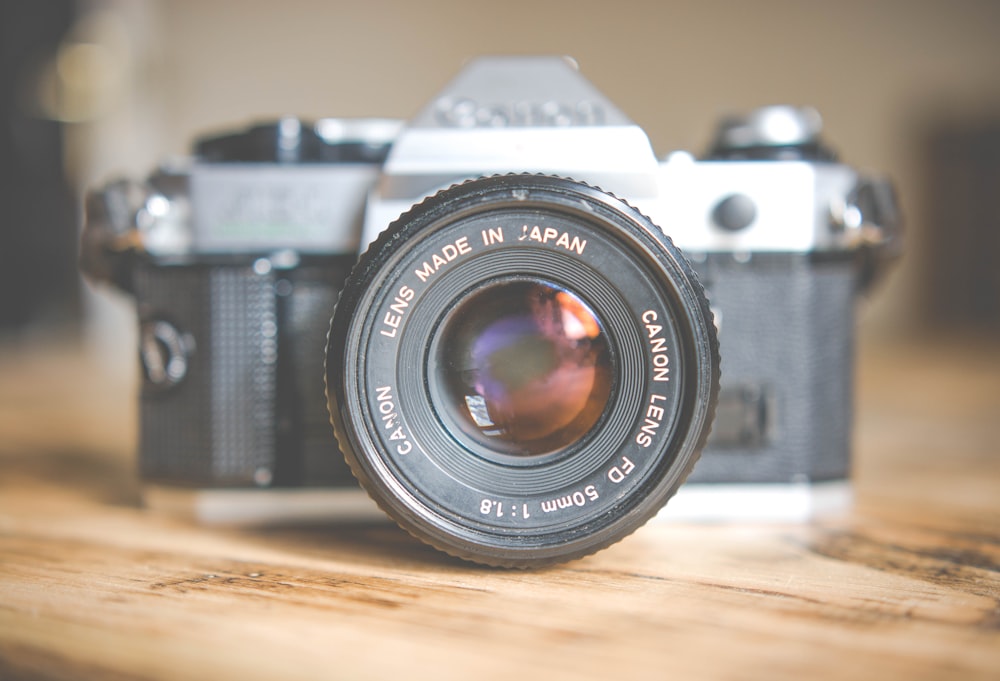 gray and black DSLR camera in shallow focus photography