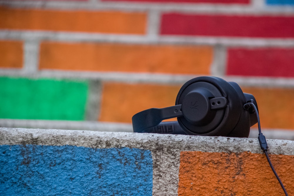 Colourful pavement with black headphones, for listening to royalty free music