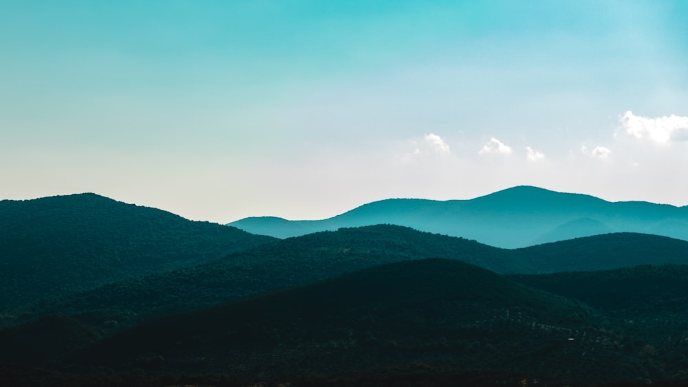 landscape photography of green mountain