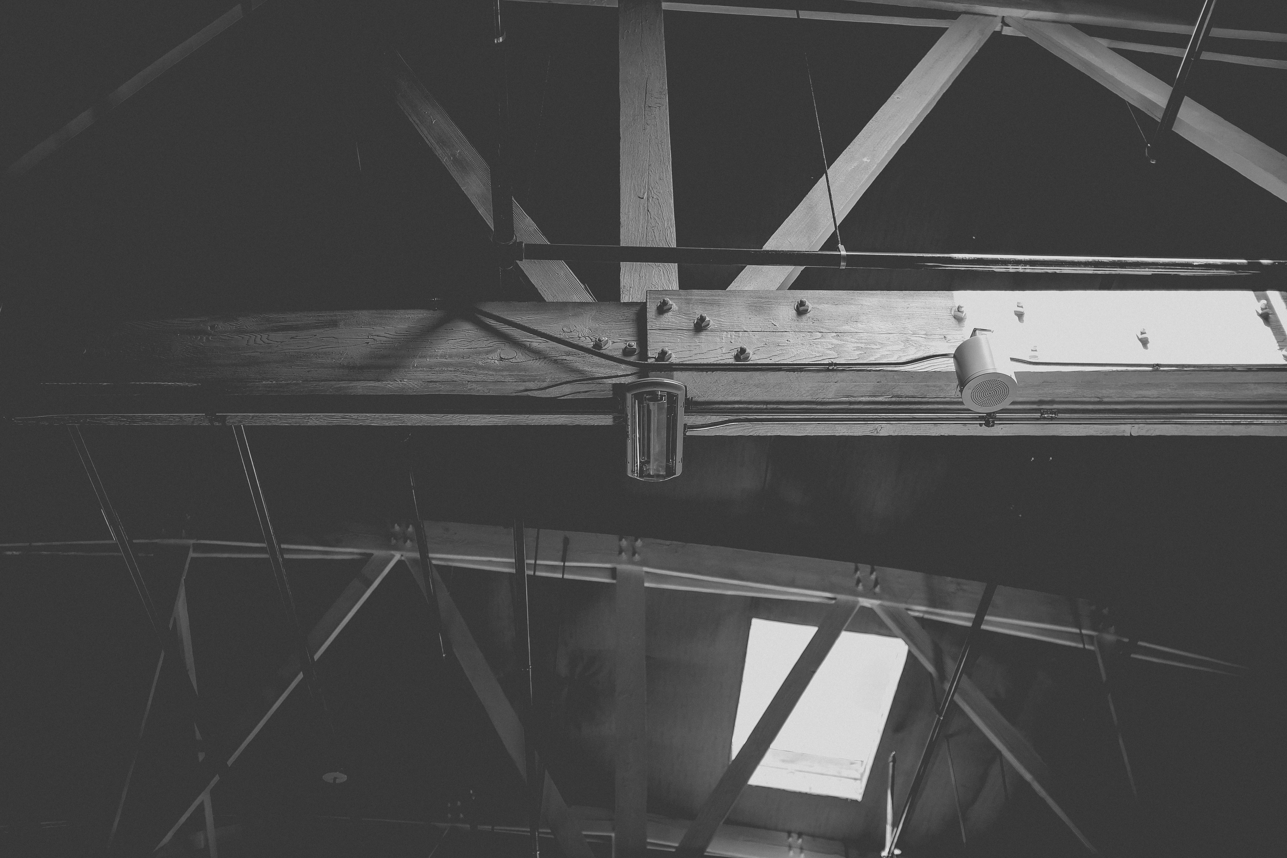 a black and white photo of a metal beam