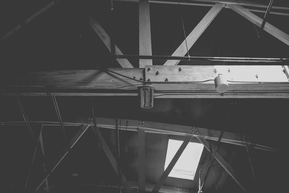 a black and white photo of a metal beam