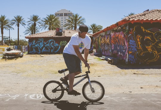 man using black BMX bicycle in Arts District United States