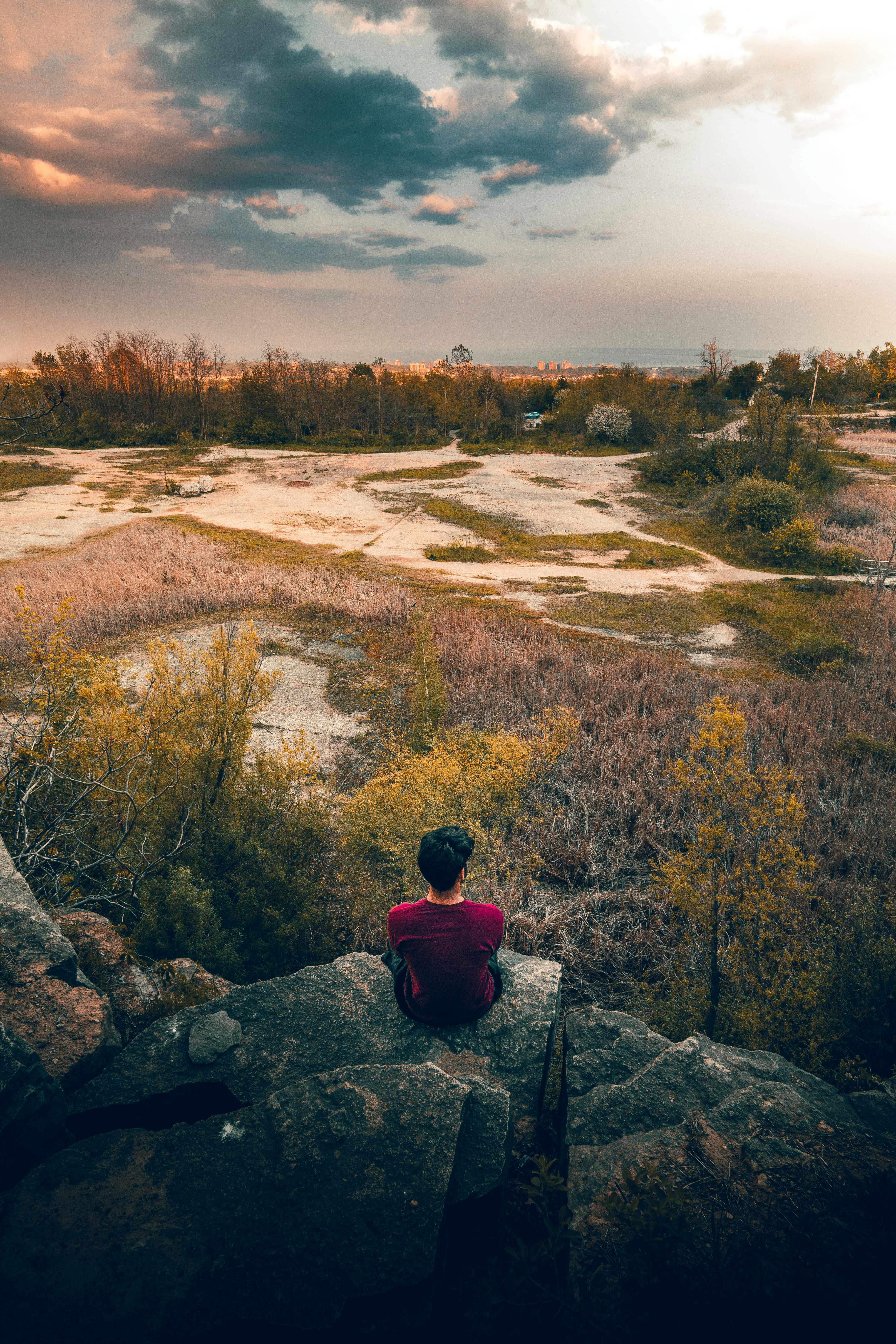 man siting on rocks