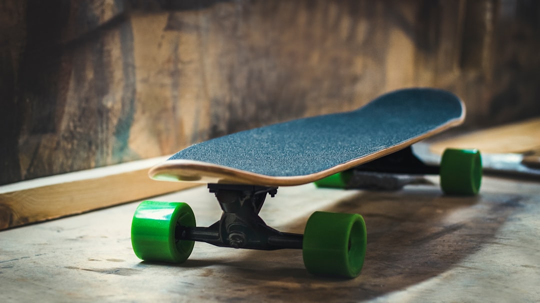 black skateboard on brown surface