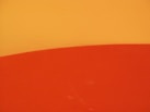 a close up of a surfboard on a wall