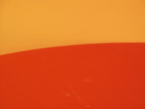 a close up of a surfboard on a wall