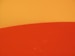 a close up of a surfboard on a wall